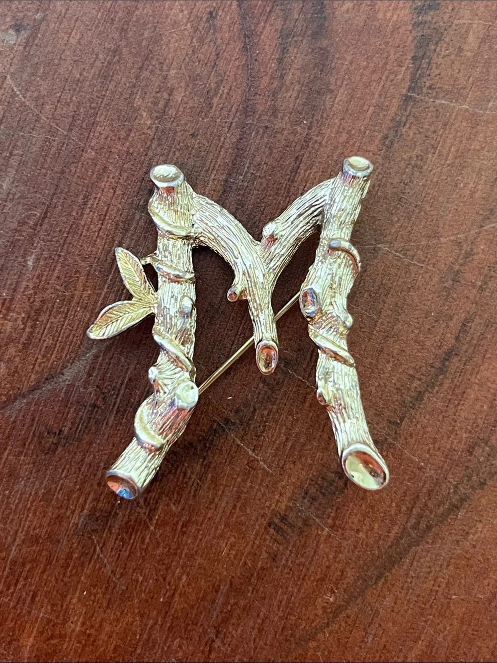Lot of Nine Brooches and Pins